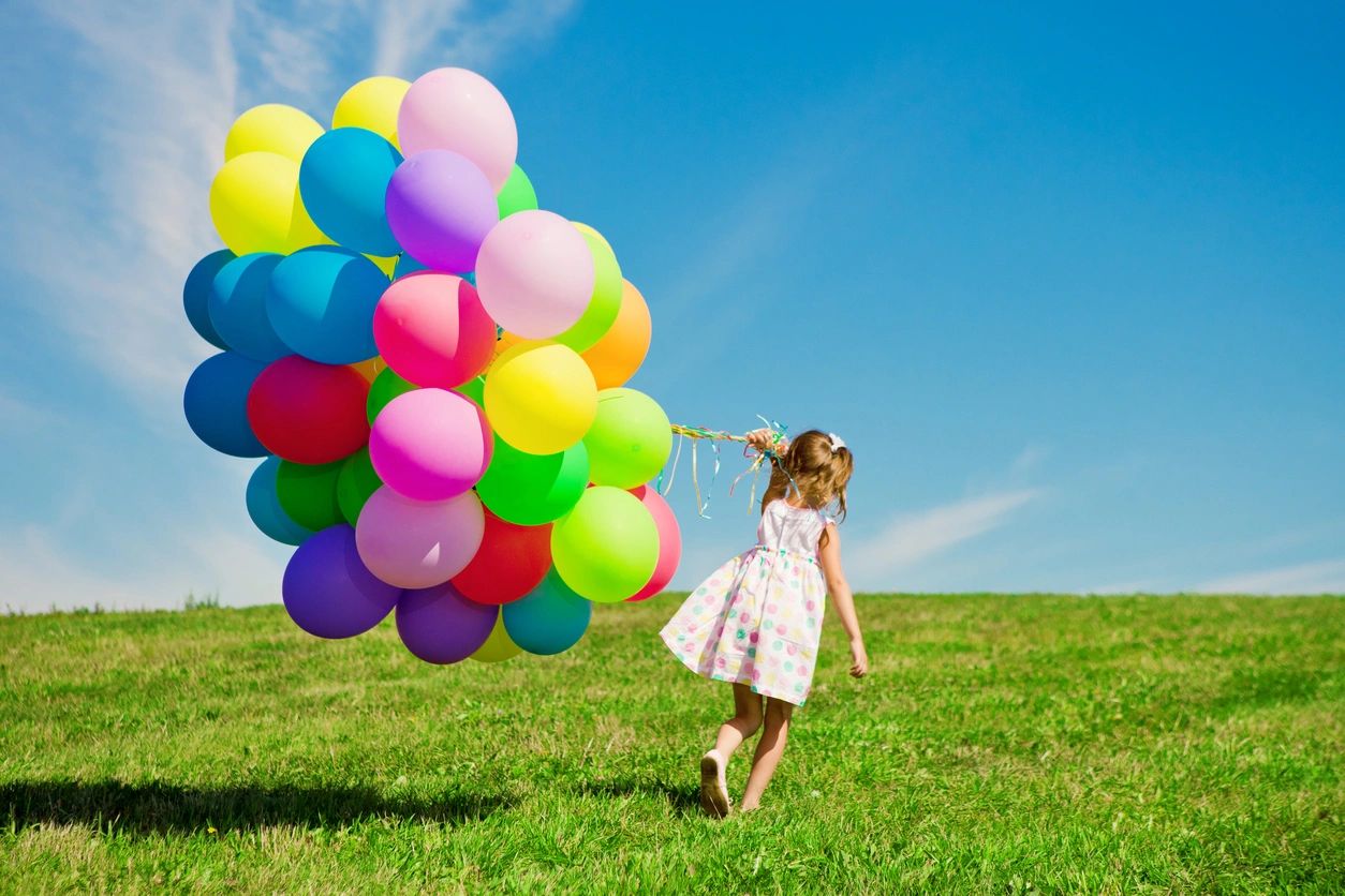 kid with balloon